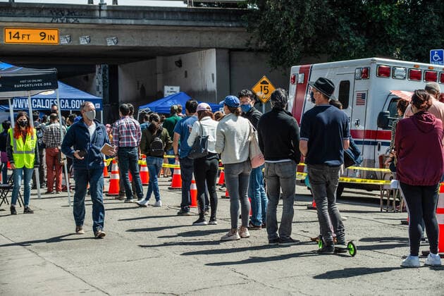 April 2, 2021, Oakland, CA, United States: Hundreds wait in cue for the Janssen COVID-19 Vaccine (Johnson & Johnson) in Oakland..A tier just opened on April 1st for vaccinations of people from age 50 and above with exceptions of 16year-olds and above with severe health conditions, these can receive vaccination. Oakland United States - ZUMAs197 20210402_zaa_s197_130 Copyright: xPatxMazzerax