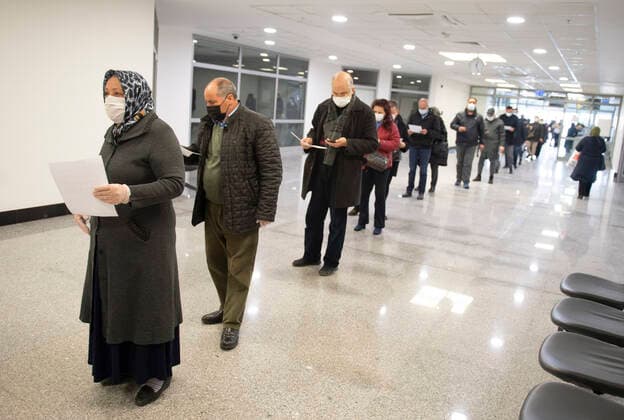 People wait in line to receive Pfizer BioNTech COVID-19 vaccine in Ankara City Hospital, Turkey, on April 3, 2021. Turkey has confirmed 31,892 deaths and 3,400,296 positive cases of the coronavirus infection in the country. ( Copyright: AbdurrahmanxAntakyalix-xDepoxPho DSC_4537