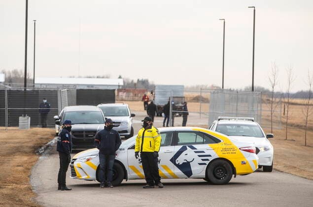 April 7, 2021, EDMONTON, ab, Canada: Security and police block the entrance to GraceLife Church as a fence goes up around it near Edmonton on Wednesday April 7, 2021. The Alberta government has closed down and fenced off a church that has been charged with refusing to follow COVID-19 health rules. Alberta Health Services, in a statement, says GraceLife church will remain closed until it shows it will comply with public-health measures meant to contain the spread of the novel coronavirus. EDMONTON Canada  - ZUMAc35_ 20210407_zaf_c35_062 Copyright: xJasonxFransonx