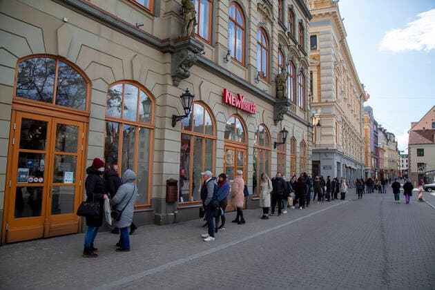 (210407) -- RIGA, April 7, 2021 -- People line up to enter a store in Riga, Latvia, on April 7, 2021. As the state of emergency, which had been in force since Nov. 9, 2020, ended on Wednesday, Latvia s retailers were rushing to reopen their stores to shoppers. During the state of emergency, only grocers and retailers selling essential goods could remain open. (Photo by Xinhua) LATVIA-RIGA-COVID-19-STATE OF EMERGENCY-END EdijsxPalens 