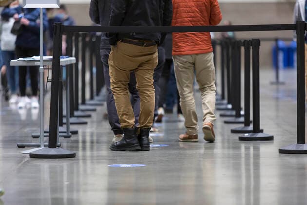 April 7, 2021, Seattle, Washington, USA: Patients wait in line to receive the first dose of the PfizerÃ¢â‚¬BioNTech COVID-19 vaccine at the Lumen Field Event Center in Seattle on Wednesday, April 7, 2021. The City of Seattle administered a record 7,615 doses of vaccine at the site on Wednesday. Seattle USA - ZUMAg235 20210407_zap_g235_004 Copyright: xPaulxChristianxGordonx