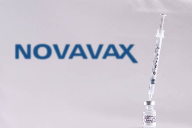 Vaccine for COVID-19 and Novavax logo, in Prague, Czech Republic, April 5, 2021. (CTKxPhoto MartinxMacakxGregor) CTKPhotoF202104070986401 