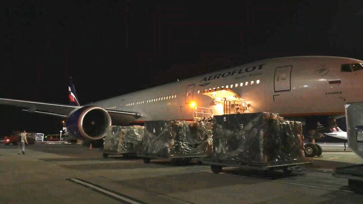 YEREVAN, ARMENIA - APRIL 8, 2021: The first batch of the Gam-COVID-Vac (Sputnik V) COVID-19 vaccine (15,000 doses) is loaded on a vehicle at Zvartnots International Airport. The vaccine will be used for vaccination of people at risk of severe COVID-19 illness. Best quality available. Video screen grab. The Republic of Armenia Ministry of Health TASS A STILL IMAGE TAKEN FROM VIDEO PROVIDED BY A THIRD PARTY. EDITORIAL USE ONLY  TS0FBF67