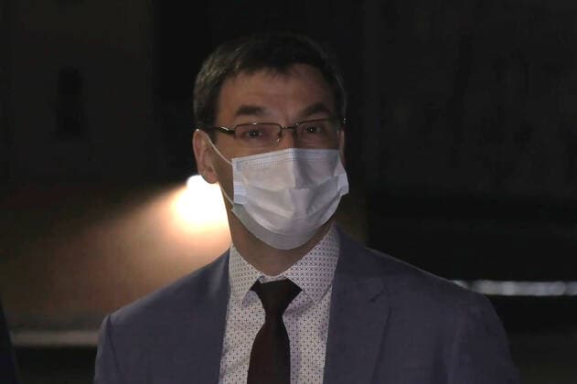 YEREVAN, ARMENIA - APRIL 8, 2021: Pavel Kurochkin, a counsellor of the Russian Embassy in Yerevan, welcomes the first batch of the Gam-COVID-Vac (Sputnik V) COVID-19 vaccine at Zvartnots International Airport. The vaccine will be used for vaccination of people at risk of severe COVID-19 illness. Best quality available. Video screen grab. The Republic of Armenia Ministry of Health TASS A STILL IMAGE TAKEN FROM VIDEO PROVIDED BY A THIRD PARTY. EDITORIAL USE ONLY  TS0FBF68