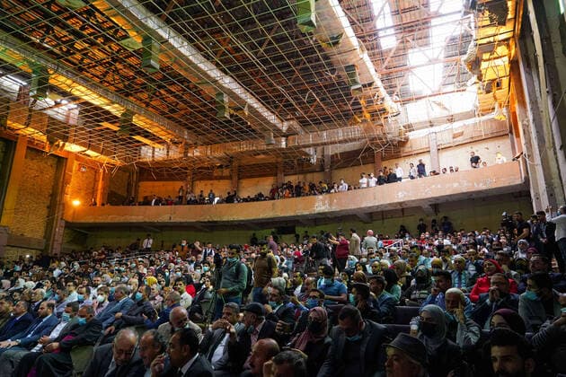April 8, 2021, Mosul, Nineveh, Iraq: The audience during a performance by the Watar orchestral, playing for the first time on the grounds of the Spring Theatre Hall, which was destroyed during the ISIS occupation in the city..The Watar orchestral includes 36 young men and women from different denominations of Nineveh Governorate, including Muslims, Christians and Yazidis, whose ages range between 8-32 years. Mosul Iraq - ZUMAs197 20210408_zaa_s197_171 Copyright: xIsmaelxAdnanx