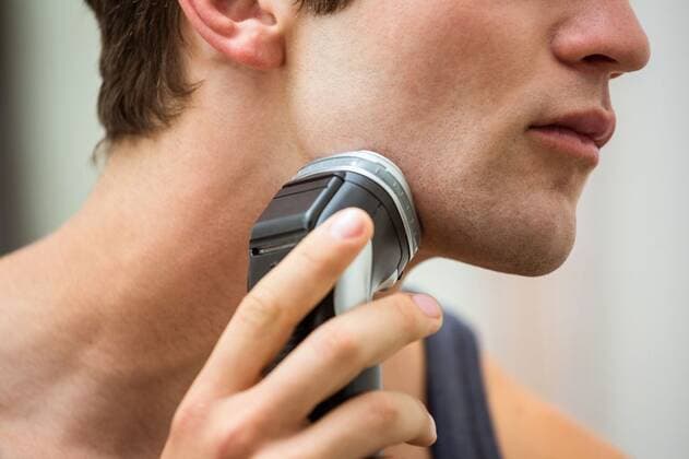 Mid-section of man shaving with trimmer Mid-section of man shaving with trimmer in bathroom, model released, , property released, Cape Town, South Africa, 08.12.2015, 711204.jpg, home, Ã‚ house, Ã‚ household, Ã‚ homey, Ã‚ apartment, domicile, Ã‚ abode, bathroom, domestic life, handsome, attractive, stubble, beard, holding, trimmer, shaver, shaving, trim, trimming, sensitive, leisure, lifestyle, charming, care, skincare, bodycare, grooming, masculinity, daily routine, routine, hygiene Indoors,Mid Section