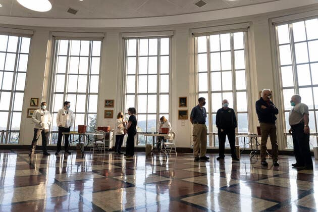 April 8, 2021, Charleston, West Virginia, United States: Medical professionals wait for the first students to arrive, during the vaccination in Riggleman Hall..The Kanawha-Charleston Health Department led a vaccination effort on the campus of the University of Charleston. 1,800 doses of the Johnson & Johnson Janssen Covid-19 vaccine were on hand to be given out to all persons aged 16 years and older. Charleston United States - ZUMAs197 20210408_zaa_s197_230 Copyright: xStephenxZennerx
