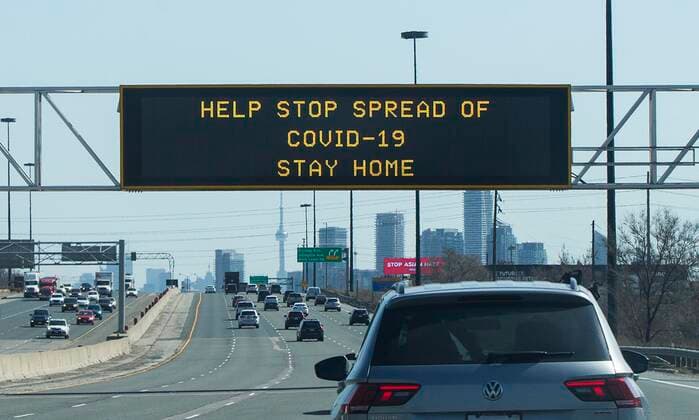 (210408) -- TORONTO, April 8, 2021 -- A screen with words of HELP STOP SPREAD OF COVID-19 STAY HOME is seen in Toronto, Ontario, Canada, on April 8, 2021. As COVID-19 cases rise due to more transmissible variants spreading across Canada, populous provinces in the country are reinstating public health restrictions to stem the pandemic. Ontario province imposed a provincewide stay-at-home order that went into effect at 12:01 a.m. Thursday and lasts 28 days. (Photo by Xinhua) CANADA-ONTARIO-COVID-19-STAY-AT-HOME ORDER ZouxZheng 
