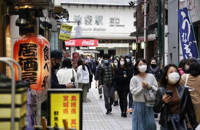 Tokyo, Kyoto, Okinawa to step up anti-COVID measures People wearing face masks to protect against the novel coronavirus walk in Tokyo on April 9, 2021. The Japanese government designated Tokyo and Kyoto and Okinawa prefectures the same day as requiring stronger measures to fight COVID-19 amid a resurgence in infections, less than three weeks after fully lifting a state of emergency. 