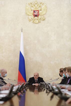 MOSCOW, RUSSIA - APRIL 9, 2021: Russia s Prime Minister Mikhail Mishustin (C) during a meeting on the production and circulation of vaccines against COVID-19 at the House of the Russian Government. Dmitry Astakhov POOL TASS  TS0FC1A1