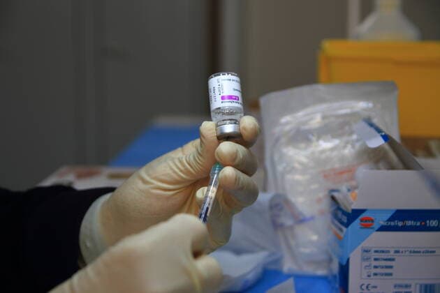 Naples : Vaccinations in the rooms of the Mother Museum Naples, Italy : April 09,2021 : In the historic center of Naples, the Local Health Agency Naples Center 1 , has opened a Covid Center in the halls of the Mother Museum (Museo Madre).Following the national vaccination plan, the elderly and fragile people with particular diseases are vaccinated. Astrazeneca and Pfizer-Biontech vacines are inoculated.After the vaccination people are allowed to stay for fifteen minutes in a library room of the Mother Museum.The nurses at the pharmacy prepare the syringes with the vaccines to be inoculated. Napoli Campania Napoli Italy Copyright: PasqualexxSenatore