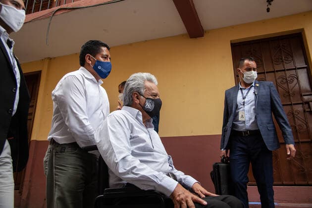 April 9, 2021, Quito, Pichincha, Ecuador: President of Ecuador Lenin Moreno, wearing a facemask makes his departure from Carmita Quichuela s home after the first phase of Covid19 vaccination in Quito..The first phase of COVID19 Vaccination in Ecuador has been carried out starting with persons with disabilities. This vaccination program is designed to reach their homes, on this occasion the beneficiary was Camita Quichuela, a 41-year-old woman who has 80% intellectual disability (ID) and is totally dependent on the care of her mother. The President of Ecuador Lenin Moreno was present at the event. Quito Ecuador - ZUMAs197 20210409_zaa_s197_283 Copyright: xJuanxDiegoxMontenegrox