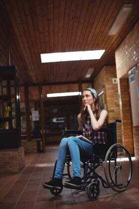 Disabled schoolgirl on wheelchair in corridor at school Thoughtful disabled schoolboy on wheelchair in corridor at school, model released, , property released, Cork, Ireland, 19.11.2016, 924079.jpg, school, corridor, high school, student, secondary, schoolgirl, casual clothing, sitting, brick wall, thoughtful, thinking, contemplation, looking, hand on chin, wheelchair, disabled, disability, handicapped, development, education, knowledge, academic, lifestyle, leisure, adolescence, teenager, teenage, youth, modern, beautiful, pretty
