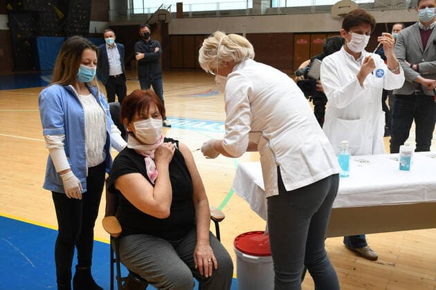 CROATIA COVID-19 mass vaccination A woman receives the Pfizer-BioNTech Comirnaty coronavirus disease (COVID-19) vaccine during a mass vaccination at Koprivnica sports hall in Koprivnica, Croatia on April 10, 2021. DamirxSpehar PIXSELL