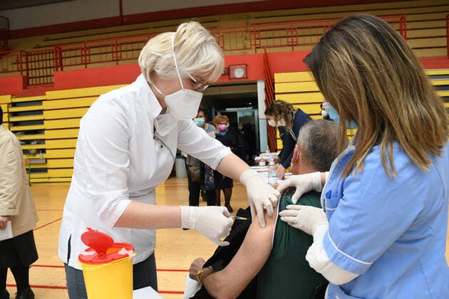 CROATIA COVID-19 mass vaccination A manreceives the Pfizer-BioNTech Comirnaty coronavirus disease (COVID-19) vaccine during a mass vaccination at Koprivnica sports hall in Koprivnica, Croatia on April 10, 2021. DamirxSpehar PIXSELL