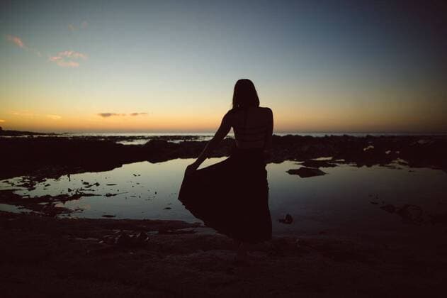 Silhouette of dancing woman Silhouette of dancing woman at dusk, model released, Cape Town, South Africa, 25.01.2017, 947950.jpg, dusk, sky, rock, stone, sea, dark, silhouette, beach, reflection, enjoyment, dance, dancing, vacation, holding, travel, nature, scene, scenic, solitude, alone, leisure, lifestyle, escapism, peaceful, calm Outdoors