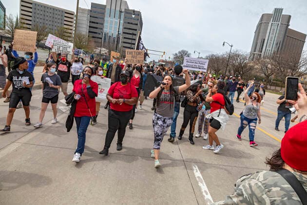April 10, 2021, Detroit, Michigan, USA: Detroit, Michigan - Activists rally outside Detroit police headquarters, protesting police who have illegally helped landlords evict tenants. The rally was organized by Detroit Will Breathe and Detroit Eviction Defense. Detroit USA - ZUMAw66_ 20210410_zaf_w66_004 Copyright: xJimxWestx