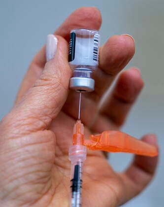 April 10, 2021, Richmond, BC, Canada: A syringe is loaded with COVID-19 vaccine at a vaccination clinic run by Vancouver Coastal Health, in Richmond, B.C., Saturday, April 10, 2021. Richmond Canada  - ZUMAc35_ 20210410_zaf_c35_041 Copyright: xJonathanxHaywardx