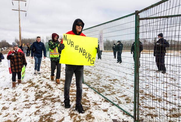 April 11, 2021, EDMONTON, ab, Canada: Supporters gather outside GraceLife Church near Edmonton, Alta., on Sunday, April 11, 2021. The church has been fenced off by police and Alberta Health Services in violation of COVID-19 rules. EDMONTON Canada  - ZUMAc35_ 20210411_zaf_c35_046 Copyright: xJasonxFransonx