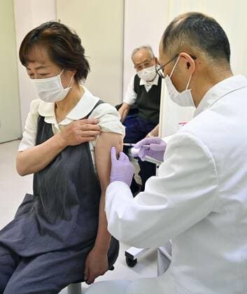 Japan starts COVID-19 vaccinations for elderly An elderly woman is inoculated against the novel coronavirus at a clinic in Kitaaiki in Nagano Prefecture, central Japan, on April 12, 2021. The country s roughly 36 million people aged 65 or older are the second group to receive COVID-19 vaccinations following health care workers. 