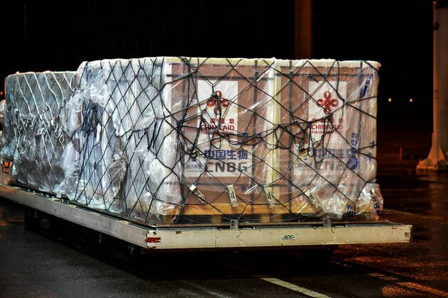 (210412) -- YAOUNDE, April 12, 2021 -- China s Sinopharm vaccines are seen at an airport in Yaounde, Cameroon, April 11, 2021. The first batch of China s Sinopharm vaccines arrived in Cameroon Sunday evening as the country is struggling with a new surge of COVID-19 infections. (Photo by Xinhua) CAMEROON-YAOUNDE-COVID-19 VACCINES-ARRIVAL JeanxPierrexKepseu 