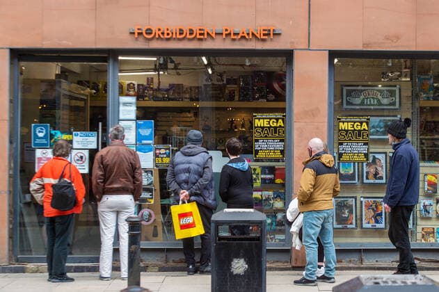 People queue to shop inside a Forbidden Planet science-fiction and fantasy entertainment shop in city centre Manchester on 12 April 2021. Customers have returned to the High Street on Monday as non-essential retailers in England and Wales reopened after more than three months of lockdown restrictions due to the Covid-19 pandemic. Manchester Greater Manchester England City Centre  Copyright: xMattxWilkinsonx
