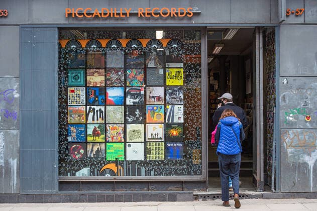 People enter the Piccadilly Records in city centre Manchester on 12 April 2021. Customers have returned to the High Street on Monday as non-essential retailers in England and Wales reopened after more than three months of lockdown restrictions due to the Covid-19 pandemic. Manchester Greater Manchester England City Centre  Copyright: xMattxWilkinsonx