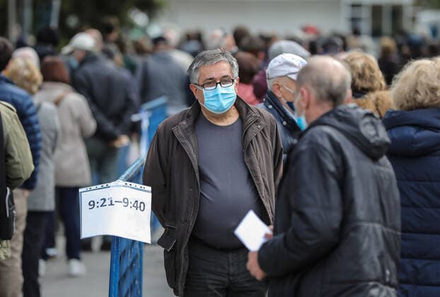 PXL_Mass vaccination in Zagreb People queue outside Zagreb Fair hall during a mass vaccination at Zagreb Fair hall in Zagreb,Croatia on April 12, 2021.By the end of the day 5,000 citizens should receive the AstraZeneca COVID-19 vaccine JuricaxGaloic PIXSELL