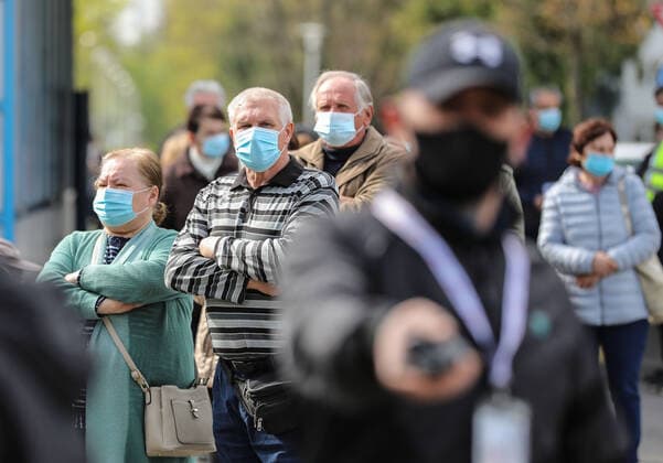 PXL_Mass vaccination in Zagreb People queue outside Zagreb Fair hall during a mass vaccination at Zagreb Fair hall in Zagreb,Croatia on April 12, 2021.By the end of the day 5,000 citizens should receive the AstraZeneca COVID-19 vaccine JuricaxGaloic PIXSELL
