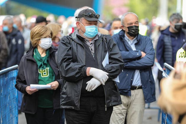 PXL_Mass vaccination in Zagreb People queue outside Zagreb Fair hall during a mass vaccination at Zagreb Fair hall in Zagreb,Croatia on April 12, 2021.By the end of the day 5,000 citizens should receive the AstraZeneca COVID-19 vaccine JuricaxGaloic PIXSELL