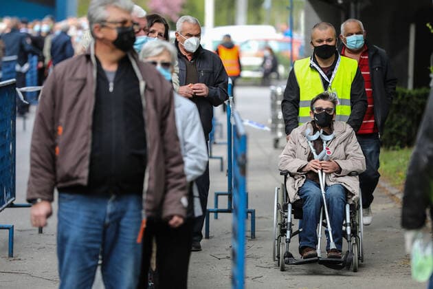 PXL_Mass vaccination in Zagreb People queue outside Zagreb Fair hall during a mass vaccination at Zagreb Fair hall in Zagreb,Croatia on April 12, 2021.By the end of the day 5,000 citizens should receive the AstraZeneca COVID-19 vaccine JuricaxGaloic PIXSELL