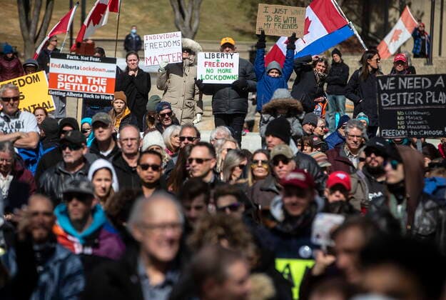 April 12, 2021, EDMONTON, ab, Canada: Anti-lockdown and anti-mask protesters take part in a rally outside the Alberta Legislature in Edmonton on Monday, April 12, 2021. EDMONTON Canada  - ZUMAc35_ 20210412_zaf_c35_039 Copyright: xJasonxFransonx