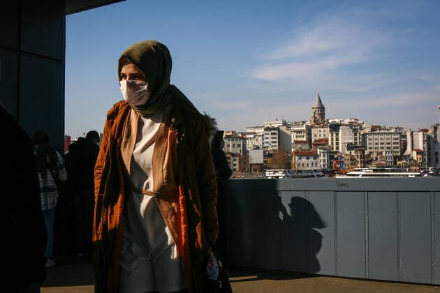 April 12, 2021, Istanbul, Turkey: A woman wearing a facemask is seen walking along the underpass of Galata Bridge in Istanbul..President Erdogan is expected to announce the new coronavirus measures to be implemented during the month of Ramadan which is starting tomorrow. Istanbul Turkey - ZUMAs197 20210412_zab_s197_045 Copyright: xHakanxAkgunx