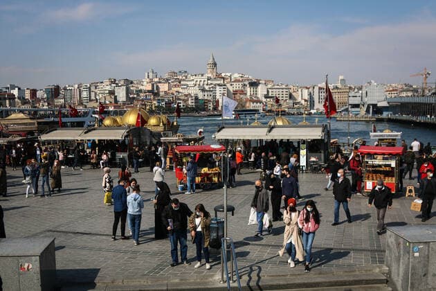 April 12, 2021, Istanbul, Turkey: People seen walking around the square in Eminonu, Istanbul..President Erdogan is expected to announce the new coronavirus measures to be implemented during the month of Ramadan which is starting tomorrow. Istanbul Turkey - ZUMAs197 20210412_zab_s197_049 Copyright: xHakanxAkgunx
