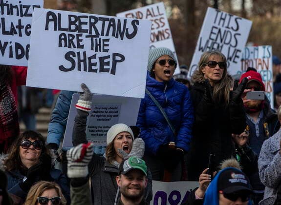 April 12, 2021, EDMONTON, ab, Canada: Anti-lockdown and anti-mask protesters take part in a rally outside the Alberta Legislature in Edmonton on Monday, April 12, 2021. EDMONTON Canada  - ZUMAc35_ 20210412_zaf_c35_043 Copyright: xJasonxFransonx