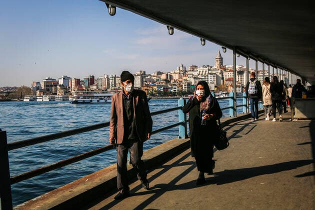 April 12, 2021, Istanbul, Turkey: People wearing masks are seen walking along the underpass of Galata Bridge in Istanbul..President Erdogan is expected to announce the new coronavirus measures to be implemented during the month of Ramadan which is starting tomorrow. Istanbul Turkey - ZUMAs197 20210412_zab_s197_058 Copyright: xHakanxAkgunx