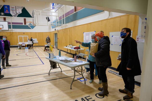 April 12, 2021: NDP Leader Kate White, second right, enters a Whitehorse polling station during the Yukon election on Monday April 12, 2021. Polls have opened across Yukon as the Liberal government led by Sandy Silver seeks a second term.  - ZUMAc35_ 20210412_zaf_c35_051 Copyright: xMarkxKellyx