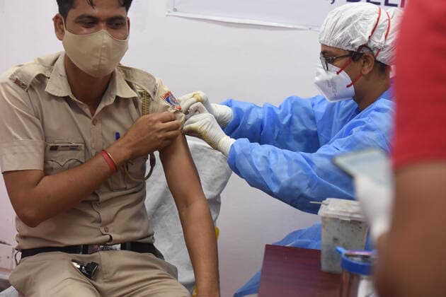 NEW DELHI, INDIA - APRIL 12: A man gets vaccinated against Covid-19, on the second day of Tika Utsav , at Rajiv Gandhi Super Specialty Hospital, on April 12, 2021 in New Delhi, India. (Photo by Raj K Raj Hindustan Times) Over 40 lakh People Vaccinated On Second Day Of Tika Utsav
