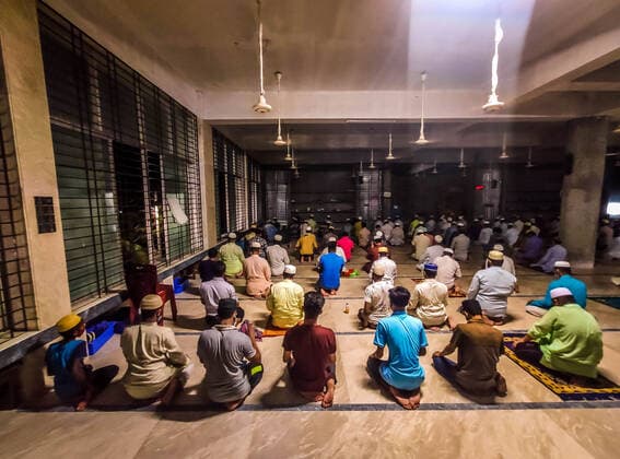 April 13, 2021, Barishal, Barishal, Bangladesh: People sat distanced lines due to Covid-19 Health Protocal and Lockdown situation during Prayer. Muslim People of Bangladesh start their mass Tarawih Prayers on April 13th. From tomorrow, Mulims will start the fasting during the following month. Barishal Bangladesh - ZUMAr337 20210413_zip_r337_054 Copyright: xMustasinurxRahmanxAlvix