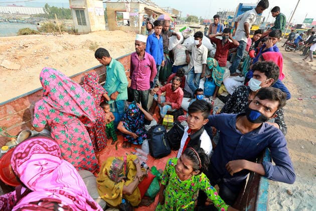 April 13, 2021, Dhaka, Dhaka, Bangladesh: April,13, 2021 People begin leaving Dhaka ahead of a new lockdown set to be enforced with stricter rules. A rush of homebound passengers is seen at the Shimulia ferry terminal Dhaka Bangladesh - ZUMAr338 20210413_zip_r338_024 Copyright: xHarun-Or-Rashidx