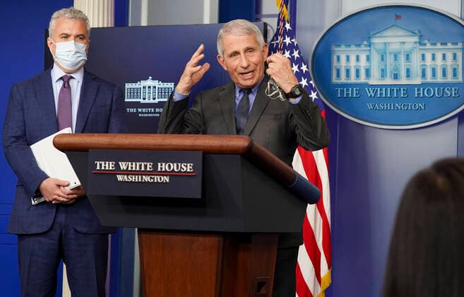 April 13, 2021, Washington, District of Columbia, USA: Chief Medical Advisor to the President Dr. Anthony Fauci answers questions as COVID-19 Response Coordinator Jeff Zients listens on during a news conference in the James S. Brady Press Briefing Room at the White House in Washington, D.C., on Tuesday, April 12, 2021. Questions directed to Dr. Fauci and Response Coordinator Zients focused on the announcement that Johnson & Johnson vaccines will be halted across the country after rare clotting cases were reported Washington USA - ZUMAs152 20210413_zaa_s152_248 Copyright: xLeighxVogelx-xPoolxViaxCnpx