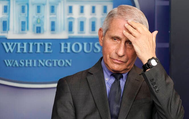 April 13, 2021, Washington, District of Columbia, USA: Chief Medical Advisor to the President Dr. Anthony Fauci listens as COVID-19 Response Coordinator Jeff Zients answers questions during a news conference in the James S. Brady Press Briefing Room at the White House in Washington, D.C., on Tuesday, April 12, 2021. Questions directed to Dr. Fauci and Response Coordinator Zients focused on the announcement that Johnson & Johnson vaccines will be halted across the country after rare clotting cases were reported Washington USA - ZUMAs152 20210413_zaa_s152_251 Copyright: xLeighxVogelx-xPoolxViaxCnpx