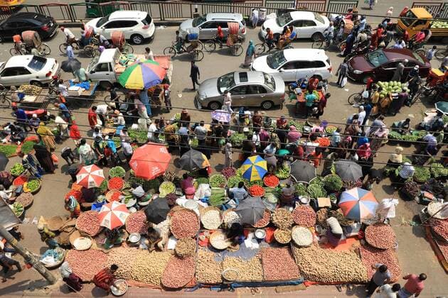 April 13, 2021, Dhaka, Bangladesh: A crowded vegetable market in Dhaka s Mirpur 1 despite a ban on large gatherings to limit the spread of the coronavirus. .Many markets continue to flout social distancing rules during the government-enforced shutdown as the outbreak worsens in Bangladesh..Bangladesh logged another 69 deaths and 6,028 new cases over the last 24 hours. Dhaka Bangladesh - ZUMAs197 20210413_zaa_s197_095 Copyright: xMdxManikx
