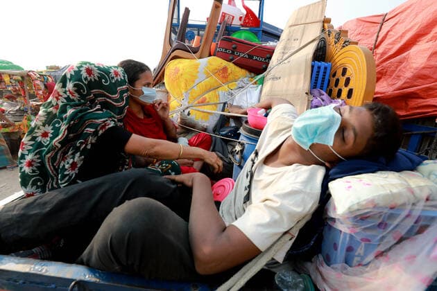 April 13, 2021, Dhaka, Dhaka, Bangladesh: People begin leaving Dhaka ahead of a new lockdown set to be enforced with stricter rules. A rush of homebound passengers is seen at the Shimulia ferry terminal Dhaka Bangladesh - ZUMAr338 20210413_zip_r338_018 Copyright: xHarun-Or-Rashidx