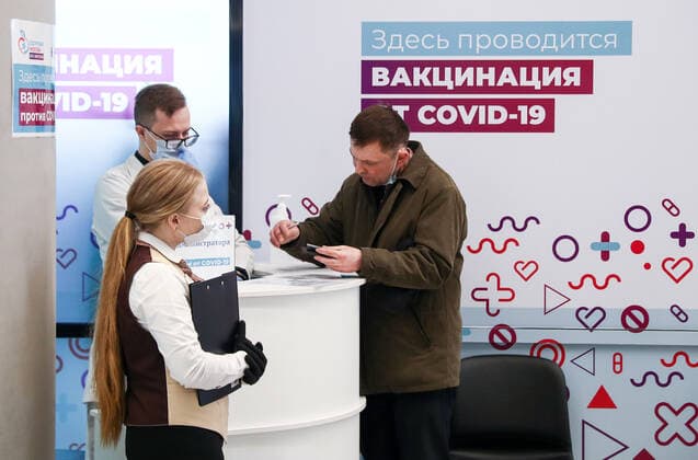 MOSCOW, RUSSIA â€“ APRIL 14, 2021: A man at a mobile COVID-19 vaccination site at the Arena Plaza shopping mall where the Gam-COVID-Vac vaccine (under the brand name of Sputnik V) is provided free of charge and without prior sign-up. Mikhail Tereshchenko TASS  TS0FCB29