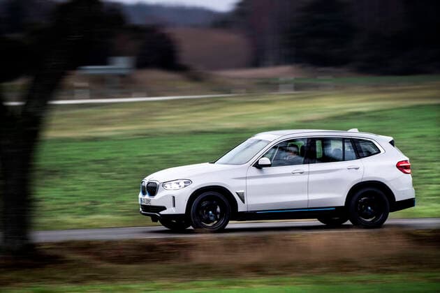 BMW iX3 Charged driving on the road. STOCKHOLM SWEDEN x10050x *** BMW iX3 Charged driving on the road STOCKHOLM SWEDEN x10050x,  Copyright: xPontusxLundahl TTx BMW IX3 CHARGED