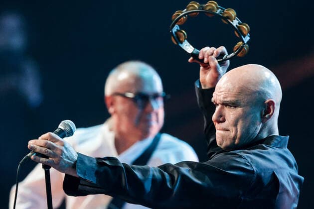 KRASNOGORSK, MOSCOW REGION, RUSSIA - APRIL 16, 2021: Guitarist Nikolai Devlet-Kildeyev (L) and lead singer Sergei Mazayev of the Russian rock band Moral Codex perform during a concert marking the band s 30th birthday at Crocus City Hall. Sergei Bobylev TASS  TS0FD088