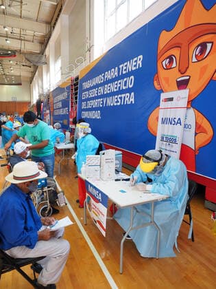 April 17, 2021, Lima, Lima, Peru: Elderly being inoculated with the Covid-19 vaccine in a sports center. The Peruvian Government enabled the sports venues of the Lima 2019 Pan American Games as vaccination centers. Lima Peru - ZUMAg240 20210417_zip_g240_015 Copyright: xCarlosxGarciaxGranthonx