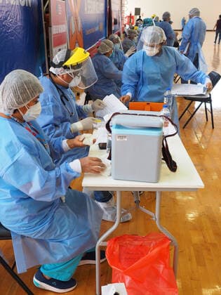 April 17, 2021, Lima, Lima, Peru: Medical staff in a vaccination post at a sports center. The Peruvian Government enabled the sports venues of the Lima 2019 Pan American Games as vaccination centers. Lima Peru - ZUMAg240 20210417_zip_g240_017 Copyright: xCarlosxGarciaxGranthonx