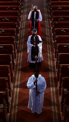 April 17, 2021, Ottawa, on, Canada: The Crucifer leads Reverend Elizabeth J. Bretzlaff, Dean of Ottawa and Rector of Christ Church Cathedral and Reverend Shane A. D. Parker, Bishop of the Anglican Diocese of Ottawa, as the recede following the National Commemorative Ceremony in honour of Prince Philip, The Duke of Edinburgh, at Christ Church Cathedral in Ottawa on Saturday, April 17, 2021. Ottawa Canada  - ZUMAc35_ 20210417_zaf_c35_016 Copyright: xSeanxKilpatrickx